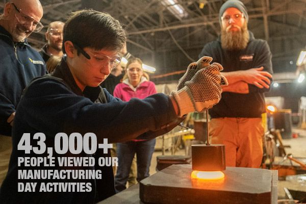 Charlie Gaull hot-pressing his design into glass. Over 43,000 people viewed our manufacturing day activities.